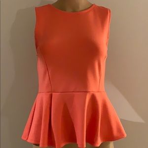 Coral peplum top